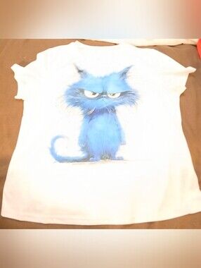 NWOT White T-Shirt with Blue Cartoon Cat Graphic.